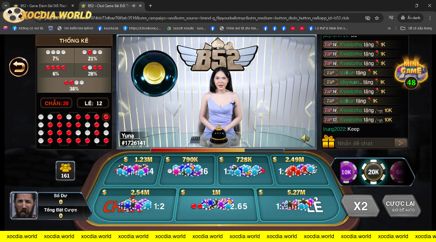 Giao diện game xóc đĩa với người chơi nữ livestream